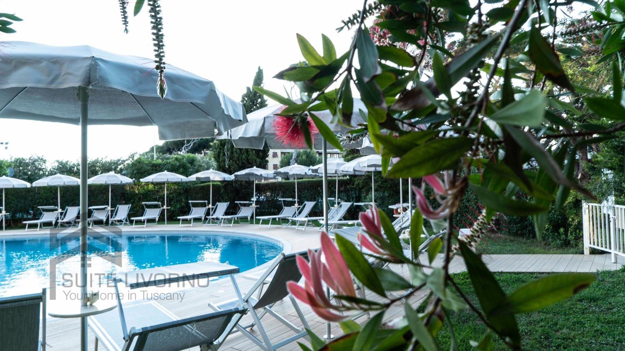 Suites Marilia Apartments Pool Side - Suite Livorno Holiday Home Group Bagian luar foto