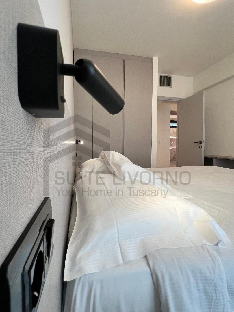 Suites Marilia Apartments Pool Side - Suite Livorno Holiday Home Group Bagian luar foto
